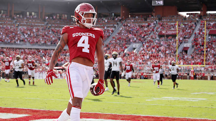 Oklahoma's Nic Anderson (4) scores touchdown in the first half of the college football game between the University of Oklahoma Sooners and the University of Central Florida Knights at Gaylord Family Oklahoma-Memorial Stadium in Norman, Okla., Saturday, Oct., 21, 2023. Oklahoma's Nic Anderson (4) scores touchdown in the first half of the college football game between the University of Oklahoma Sooners and the University of Central Florida Knights at Gaylord Family Oklahoma-Memorial Stadium in Norman, Okla., Saturday, Oct., 21, 2023.