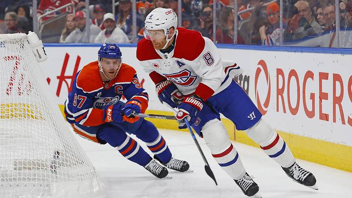 Oct 23, 2025; Edmonton, Alberta, CAN; Montreal Canadiens defensemen Mike Matheson (8) makes a pass in front of Edmonton Oilers forward Connor McDavid (97) during the first period at Rogers Place. Mandatory Credit: Perry Nelson-Imagn Images Oct 23, 2025; Edmonton, Alberta, CAN; Montreal Canadiens defensemen Mike Matheson (8) makes a pass in front of Edmonton Oilers forward Connor McDavid (97) during the first period at Rogers Place. Mandatory Credit: Perry Nelson-Imagn Images