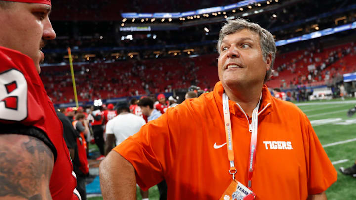 Clemson's offensive line coach Matt Luke speaks with Georgia offensive lineman Tate Ratledge (69) after the NCAA Aflac Kickoff Game in Atlanta, on Saturday, Aug. 31, 2024. Georgia won 34-3. Clemson's offensive line coach Matt Luke speaks with Georgia offensive lineman Tate Ratledge (69) after the NCAA Aflac Kickoff Game in Atlanta, on Saturday, Aug. 31, 2024. Georgia won 34-3.