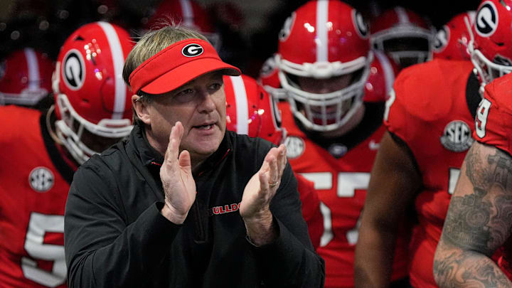 Georgia coach Kirby Smart takes the field with his team before the start of the SEC championship game against Texas in Atlanta, on Saturday, Dec. 7, 2024.