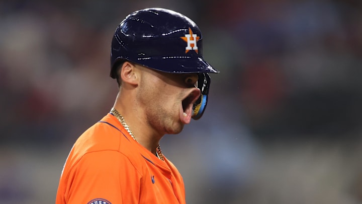 Houston Astros pinch hitter Cam Smith (11) reacts after reaching third base with a triple during the eighth inning against the Texas Rangers at Globe Life Field. 