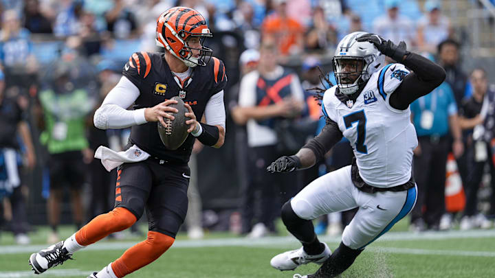 Sep 29, 2024; Charlotte, North Carolina, USA; Carolina Panthers linebacker Jadeveon Clowney (7) pressures Cincinnati Bengals quarterback Joe Burrow (9) during 1st quarter at Bank of America Stadium. Mandatory Credit: Jim Dedmon-Imagn Images Sep 29, 2024; Charlotte, North Carolina, USA; Carolina Panthers linebacker Jadeveon Clowney (7) pressures Cincinnati Bengals quarterback Joe Burrow (9) during 1st quarter at Bank of America Stadium. Mandatory Credit: Jim Dedmon-Imagn Images
