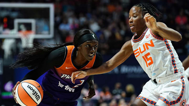 Phoenix Mercury guard Kahleah Copper (2) drives the ball against Connecticut Sun guard Lindsay Allen (15) in the second half at Mohegan Sun Arena. Phoenix Mercury guard Kahleah Copper (2) drives the ball against Connecticut Sun guard Lindsay Allen (15) in the second half at Mohegan Sun Arena.