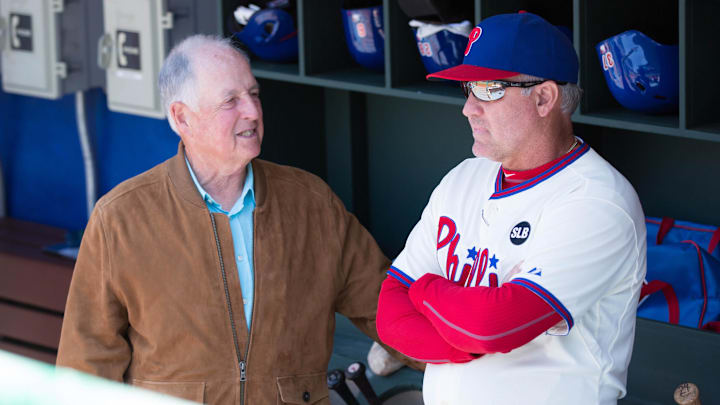 May 14, 2015; Philadelphia, PA, USA; Philadelphia Phillies interim chief executive officer Pat Gillick talks with manager Ryne Sandberg (23) prior to a game against the Pittsburgh Pirates at Citizens Bank Park. The Phillies won 4-2. Mandatory Credit: Bill Streicher-Imagn Images