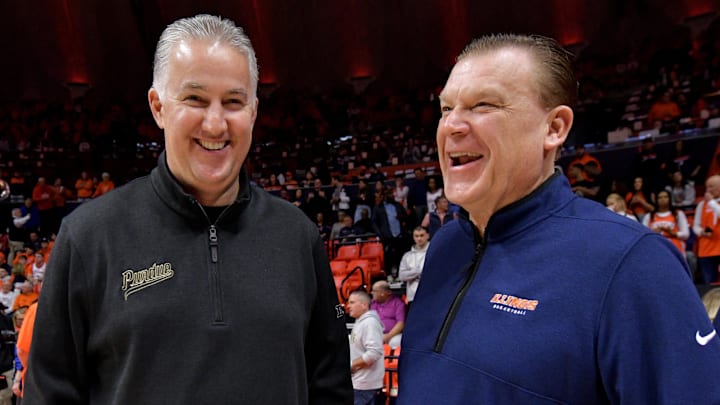 Mar 5, 2024; Champaign, Illinois, USA; Purdue Boilermakers head coach Matt Painter and Illinois Fighting Illini head coach Brad Underwood chat before the start of the game at State Farm Center. Mandatory Credit: Ron Johnson-Imagn Images