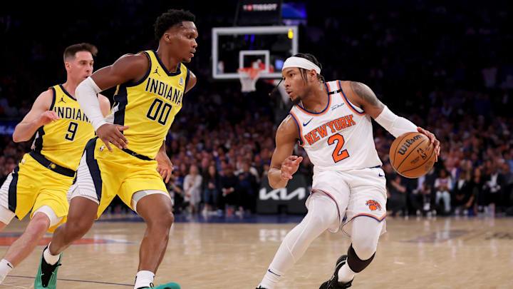 May 21, 2025; New York, New York, USA; New York Knicks guard Miles McBride (2) controls the ball against Indiana Pacers guard Bennedict Mathurin (00) in the third quarter during game one of the eastern conference finals for the 2025 NBA Playoffs at Madison Square Garden. Mandatory Credit: Brad Penner-Imagn Images