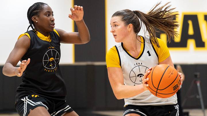 Iowa guard Taylor Stremlow catches a pass as Dani Carnegie defends during an Iowa women’s basketball practice July 23, 2026 at Carver-Hawkeye Arena in Iowa City, Iowa.