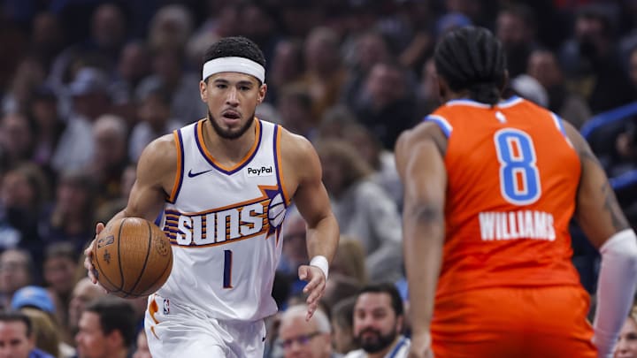 Nov 28, 2025; Oklahoma City, Oklahoma, USA;Phoenix Suns guard Devin Booker (1) dribbles down the court against the Oklahoma City Thunder during the first quarter at Paycom Center. Mandatory Credit: Alonzo Adams-Imagn Images Nov 28, 2025; Oklahoma City, Oklahoma, USA;Phoenix Suns guard Devin Booker (1) dribbles down the court against the Oklahoma City Thunder during the first quarter at Paycom Center. Mandatory Credit: Alonzo Adams-Imagn Images