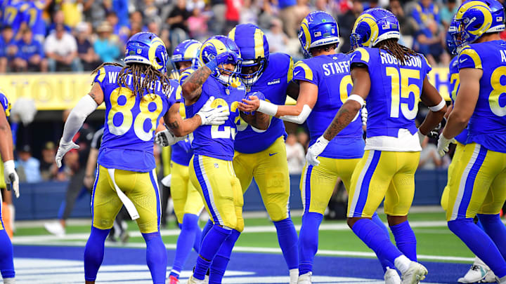Dec 8, 2024; Inglewood, California, USA; Los Angeles Rams running back Kyren Williams (23) celebrates his touchdown scored against the Buffalo Bills during the first half at SoFi Stadium. Mandatory Credit: Gary A. Vasquez-Imagn Images