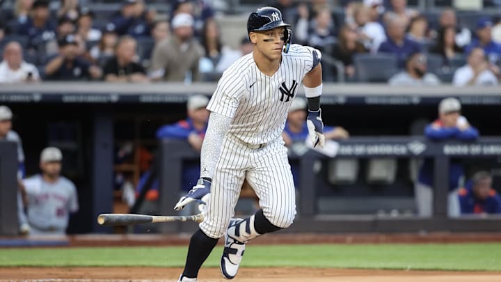 May 18, 2025; Bronx, New York, USA;  New York Yankees right fielder Aaron Judge (99) hits a double in the first inning against the New York Mets at Yankee Stadium. Mandatory Credit: Wendell Cruz-Imagn Images