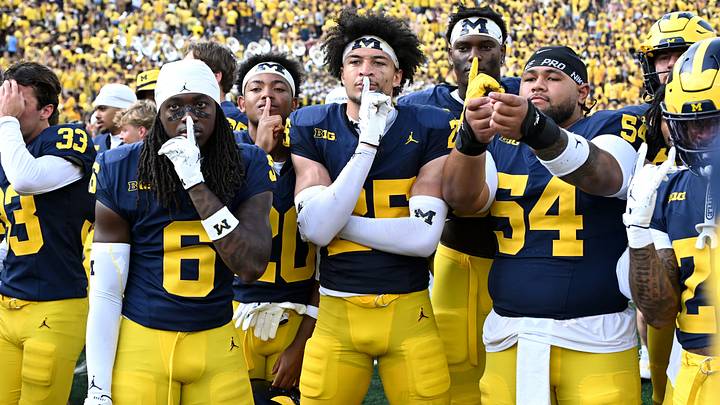 Sep 12, 2026; Ann Arbor, Michigan, USA;  Michigan Wolverines wide receiver JJ Buchanan (6), safety Mason Curtis (25) and defensive line Deyvid Palepale (54) celebrate after defeating the Oklahoma Sooners in the game at Michigan Stadium.  Mandatory Credit: Lon Horwedel-Imagn Images