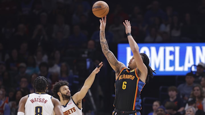 Mar 9, 2025; Oklahoma City, Oklahoma, USA;Oklahoma City Thunder forward Jaylin Williams (6) shoots a three point basket against the Denver Nuggets during the second quarter at Paycom Center. Mandatory Credit: Alonzo Adams-Imagn Images