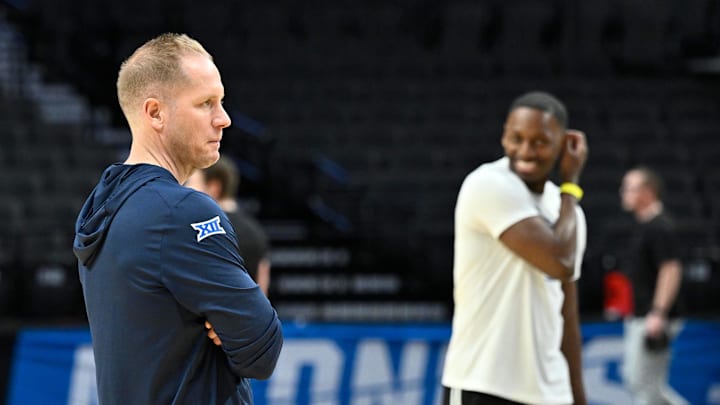 Mar 18, 2026; Portland, OR, USA; BYU Cougars head coach Kevin Young watches his team during a practice session ahead of the first round of the men's 2026 NCAA Tournament at Moda Center. Mandatory Credit: Craig Strobeck-Imagn Images Mar 18, 2026; Portland, OR, USA; BYU Cougars head coach Kevin Young watches his team during a practice session ahead of the first round of the men's 2026 NCAA Tournament at Moda Center. Mandatory Credit: Craig Strobeck-Imagn Images