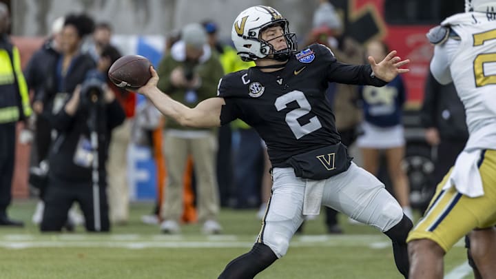 Dec 27, 2024; Birmingham, AL, USA;  Vanderbilt Commodores quarterback Diego Pavia (2) throws the ball against the Georgia Tech Yellow Jackets during the first half of the 2024 Birmingham Bowl at Protective Stadium. Mandatory Credit: Vasha Hunt-Imagn Images