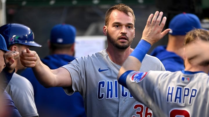 Jun 7, 2023; Anaheim, California, USA;  Chicago Cubs first baseman Trey Mancini (36) is greeted in the dugout after an RBI double and scoring a run in the fifth inning against the Los Angeles Angels at Angel Stadium. 
