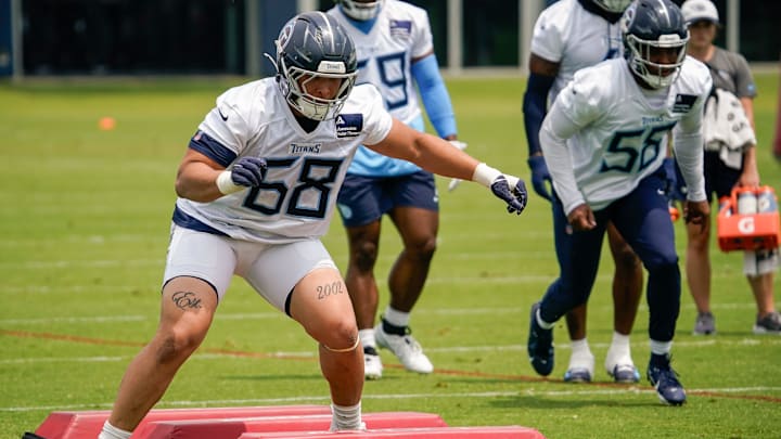 Tennessee Titans defensive tackle Devonte O'Malley (68) runs drills during minicamp practice at Ascension Saint Thomas Sports Park in Nashville, Tenn., Wednesday, June 11, 2025.