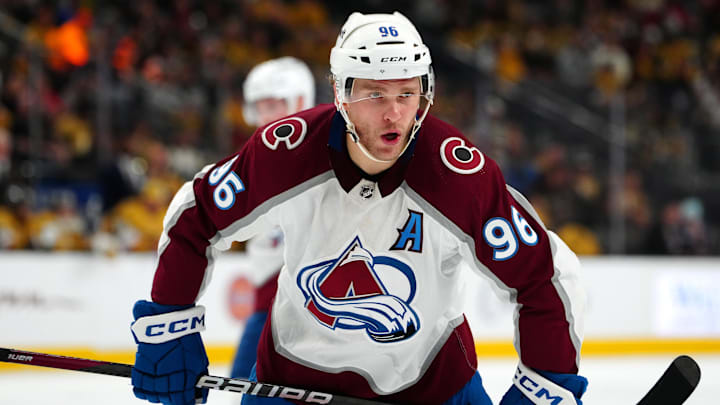 Apr 14, 2024; Las Vegas, Nevada, USA; Colorado Avalanche right wing Mikko Rantanen (96) talks to a team mate before a face off against the Vegas Golden Knights during the second period at T-Mobile Arena. Mandatory Credit: Stephen R. Sylvanie-Imagn Images