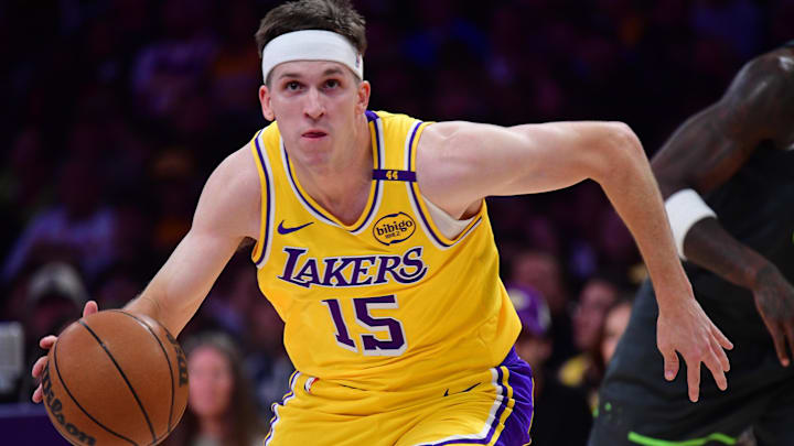 Apr 30, 2025; Los Angeles, California, USA; Los Angeles Lakers guard Austin Reaves (15) moves to the basket against the Minnesota Timberwolves during the first half in game five of first round for the 2025 NBA Playoffs at Crypto.com Arena. Mandatory Credit: Gary A. Vasquez-Imagn Images
