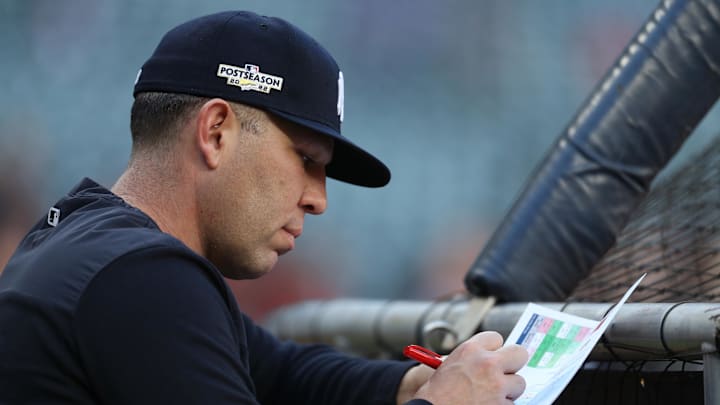 Oct 20, 2022; Houston, Texas, USA; New York Yankees hitting coach Dillon Lawson takes notes before