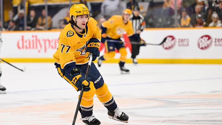 Feb 4, 2026; Nashville, Tennessee, USA; Nashville Predators right wing Luke Evangelista (77) skates with the puck during the first period at Bridgestone Arena. Mandatory Credit: Steve Roberts-Imagn Images Feb 4, 2026; Nashville, Tennessee, USA; Nashville Predators right wing Luke Evangelista (77) skates with the puck during the first period at Bridgestone Arena. Mandatory Credit: Steve Roberts-Imagn Images