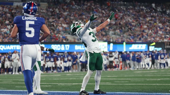 New York Jets safety Dean Clark (35) celebrates after breaking up a pass intended for New York Giants wide receiver Juice Wells Jr. (not pictured) during the second half at MetLife Stadium. Mandatory Credit: Vincent Carchietta-Imagn Images