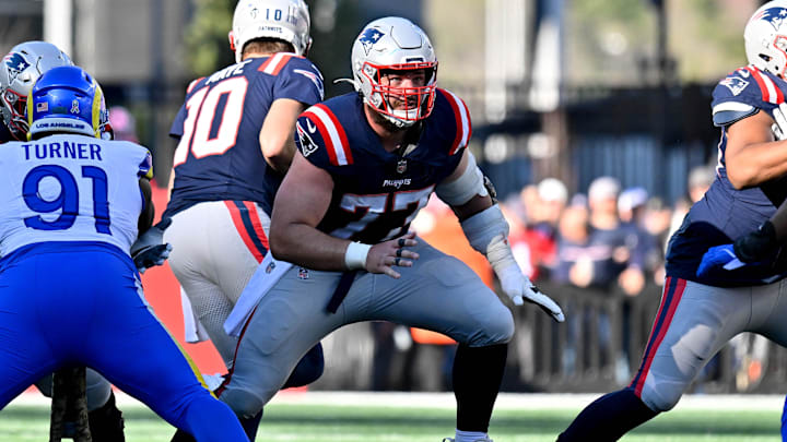 Nov 17, 2024; Foxborough, Massachusetts, USA; New England Patriots center Ben Brown (77) in action during the first half against the Los Angeles Rams at Gillette Stadium. Mandatory Credit: Eric Canha-Imagn Images