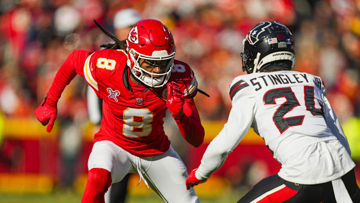 Dec 21, 2024; Kansas City, Missouri, USA; Kansas City Chiefs wide receiver DeAndre Hopkins (8) runs against Houston Texans cornerback Derek Stingley Jr. (24) during the first half at GEHA Field at Arrowhead Stadium. Mandatory Credit: Jay Biggerstaff-Imagn Images