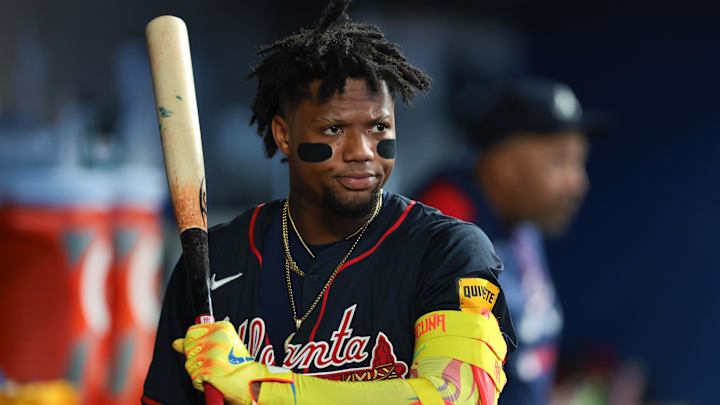 Aug 27, 2025; Miami, Florida, USA; Atlanta Braves designated hitter Ronald Acuna (13) swings his bat inside the dugout against the Miami Marlins during the fourth inning at loanDepot Park. Mandatory Credit: Sam Navarro-Imagn Images
