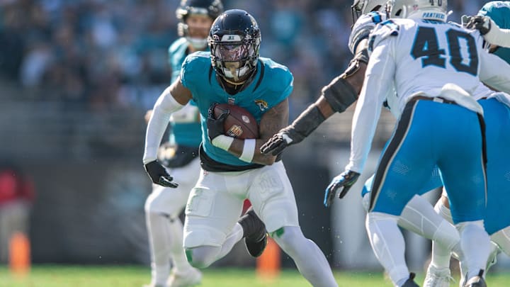Dec 31, 2023; Jacksonville, Florida, USA; Jacksonville Jaguars running back Travis Etienne Jr. (1)