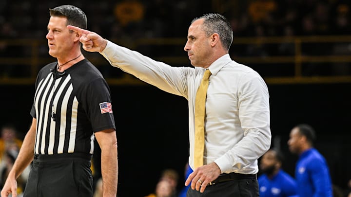 Iowa Hawkeyes head coach Ben McCollum