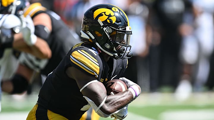 Sep 2, 2023; Iowa City, Iowa, USA; Iowa Hawkeyes running back Kaleb Johnson (2) runs the ball against the Utah State Aggies during the second quarter at Kinnick Stadium.