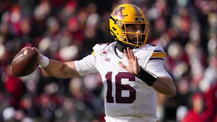 Nov 29, 2024; Madison, Wisconsin, USA; Minnesota Golden Gophers quarterback Max Brosmer (16) throws a pass during the first quarter against the Wisconsin Badgers at Camp Randall Stadium. Nov 29, 2024; Madison, Wisconsin, USA; Minnesota Golden Gophers quarterback Max Brosmer (16) throws a pass during the first quarter against the Wisconsin Badgers at Camp Randall Stadium.