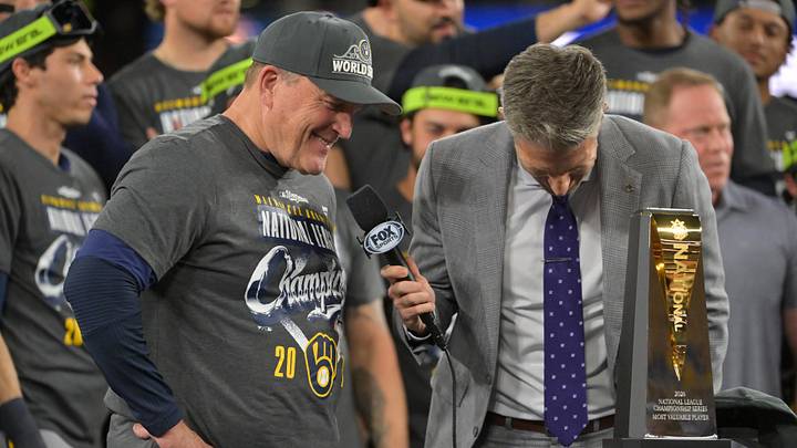 Oct 15, 2026; Los Angeles, California, USA; Milwaukee Brewers manager Pat Murphy celebrates on the podium after defeating the against the Los Angeles Dodgers in game four of the NLCS for the 2026 MLB Playoffs at Uniqlo Field at Dodger Stadium. Mandatory Credit: Jayne Kamin-Oncea-Imagn Images Oct 15, 2026; Los Angeles, California, USA; Milwaukee Brewers manager Pat Murphy celebrates on the podium after defeating the against the Los Angeles Dodgers in game four of the NLCS for the 2026 MLB Playoffs at Uniqlo Field at Dodger Stadium. Mandatory Credit: Jayne Kamin-Oncea-Imagn Images