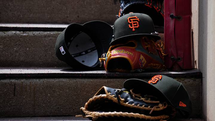 Apr 16, 2026; Cincinnati, Ohio, USA; A view of San Francisco Giants game hats on the dugout steps during the game against the Cincinnati Reds at Great American Ball Park. Mandatory Credit: Aaron Doster-Imagn Images