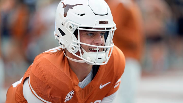 Texas Longhorns quarterback Arch Manning warms up before a game against Austin FC at Darrell K Royal-Texas Memorial Stadium.