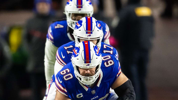 Jan 21, 2024; Orchard Park, New York, USA; Buffalo Bills center Mitch Morse (60) prepares to snap