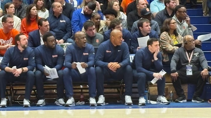 February 16, 2026; Durham, N.C., USA; Syracuse Orange head coach Adrian Autry (second from right), and his assistant coaches watch the action during the second half of a 101-64 loss to Duke at Cameron Indoor Stadium. Mandatory Credit: Brad Bierman, The Juice Online - On SI 