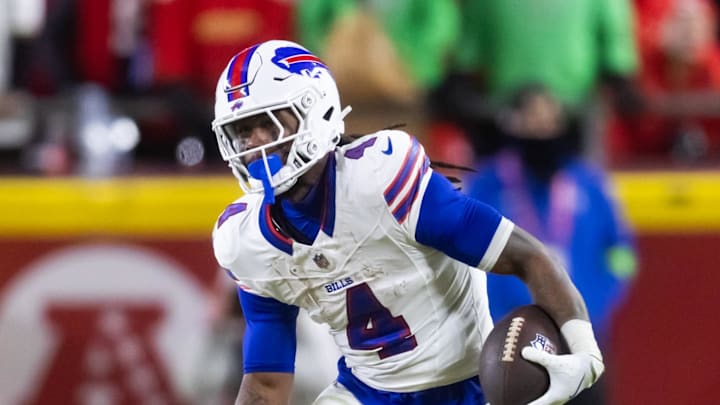 Jan 26, 2025; Kansas City, MO, USA; Buffalo Bills running back James Cook (4) against the Kansas City Chiefs during the AFC Championship game at GEHA Field at Arrowhead Stadium. Mandatory Credit: Mark J. Rebilas-Imagn Images
