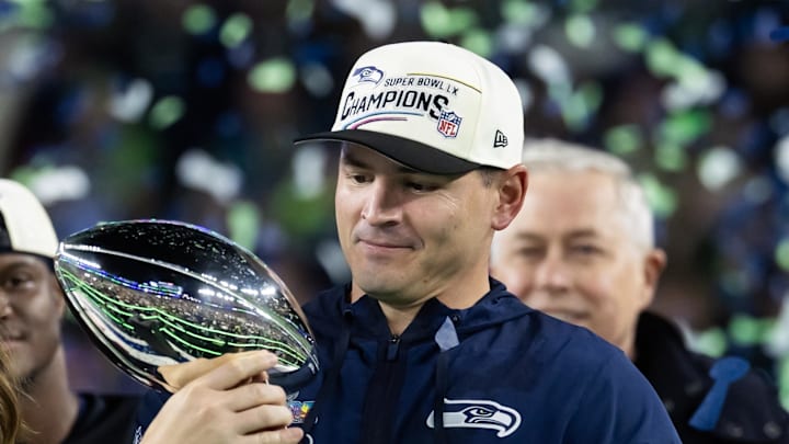 Seattle Seahawks head coach Mike Macdonald celebrates with the Vince Lombardi trophy