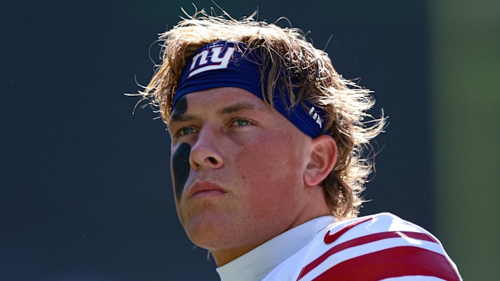 Oct 26, 2025; Philadelphia, Pennsylvania, USA; New York Giants quarterback Jaxson Dart looks on before opening kick off against the Philadelphia Eagles at Lincoln Financial Field.