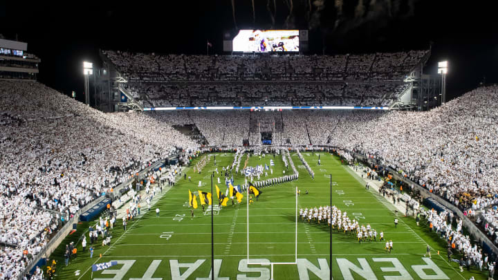 Penn State and Iowa take the field at the same time to to play in a White Out football game at Beaver Stadium. 