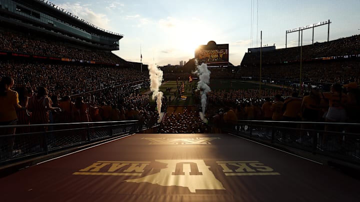 Aug 28, 2025; Minneapolis, Minnesota, USA; Minnesota Golden Gophers players take the field before the game against the Buffalo Bulls at Huntington Bank Stadium. Mandatory Credit: Matt Krohn-Imagn Images