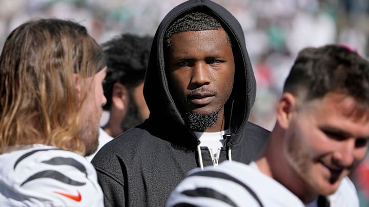 Cincinnati Bengals wide receiver Tee Higgins (5) talks with his teammates as the Bengals face the Philadelphia Eagles during the NFL Week 8 matchup at Paycor Stadium Sunday October 27, 2024. Higgins missed the game due to an injury.