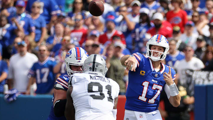 Bills quarterback Josh Allen throws short over the middle.
