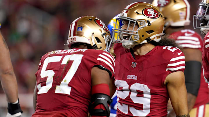 Dec 12, 2024; Santa Clara, California, USA; San Francisco 49ers linebacker Dre Greenlaw (57) is congratulated by safety Talanoa Hufanga (29) after making a tackle against the Los Angeles Rams in the first quarter at Levi's Stadium. Dec 12, 2024; Santa Clara, California, USA; San Francisco 49ers linebacker Dre Greenlaw (57) is congratulated by safety Talanoa Hufanga (29) after making a tackle against the Los Angeles Rams in the first quarter at Levi's Stadium.
