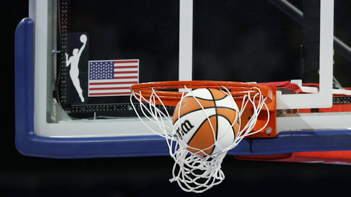Aug 3, 2025; Chicago, Illinois, USA; Wilson basketball is seen next to WNBA logo before a game between the Chicago Sky and Phoenix Mercury at Wintrust Arena. Mandatory Credit: Kamil Krzaczynski-Imagn Images