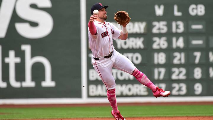 May 10, 2026; Boston, Massachusetts, USA;  Boston Red Sox third baseman Caleb Durbin (5) throws to first base for an out during the first inning against the Tampa Bay Rays at Fenway Park. Mandatory Credit: Bob DeChiara-Imagn Images