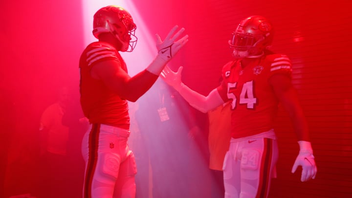 San Francisco 49ers defensive end Nick Bosa (L) and Fred Warner (R)
