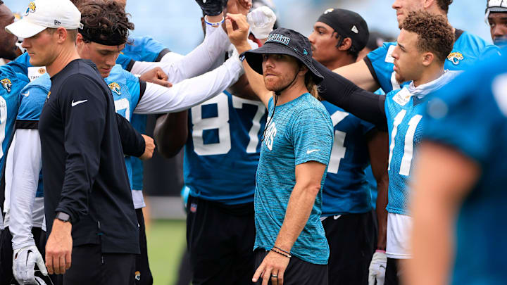 Jacksonville Jaguars wide receivers coach Chad Hall huddles during the first day of a mandatory