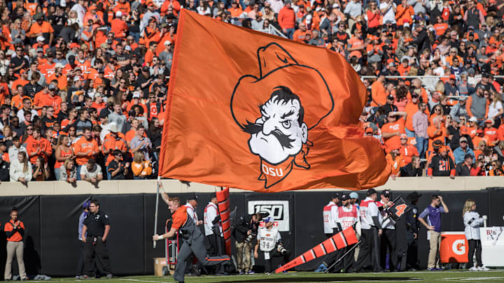 Nov 2, 2019; Stillwater, OK, USA; The Oklahoma State Cowboys flag is run across the field after a Cowboy field goal during the first quarter of the game against the TCU Horned Frogs at Boone Pickens Stadium. Oklahoma State defeated TCU 34-27. Mandatory Credit: Brett Rojo-Imagn Images